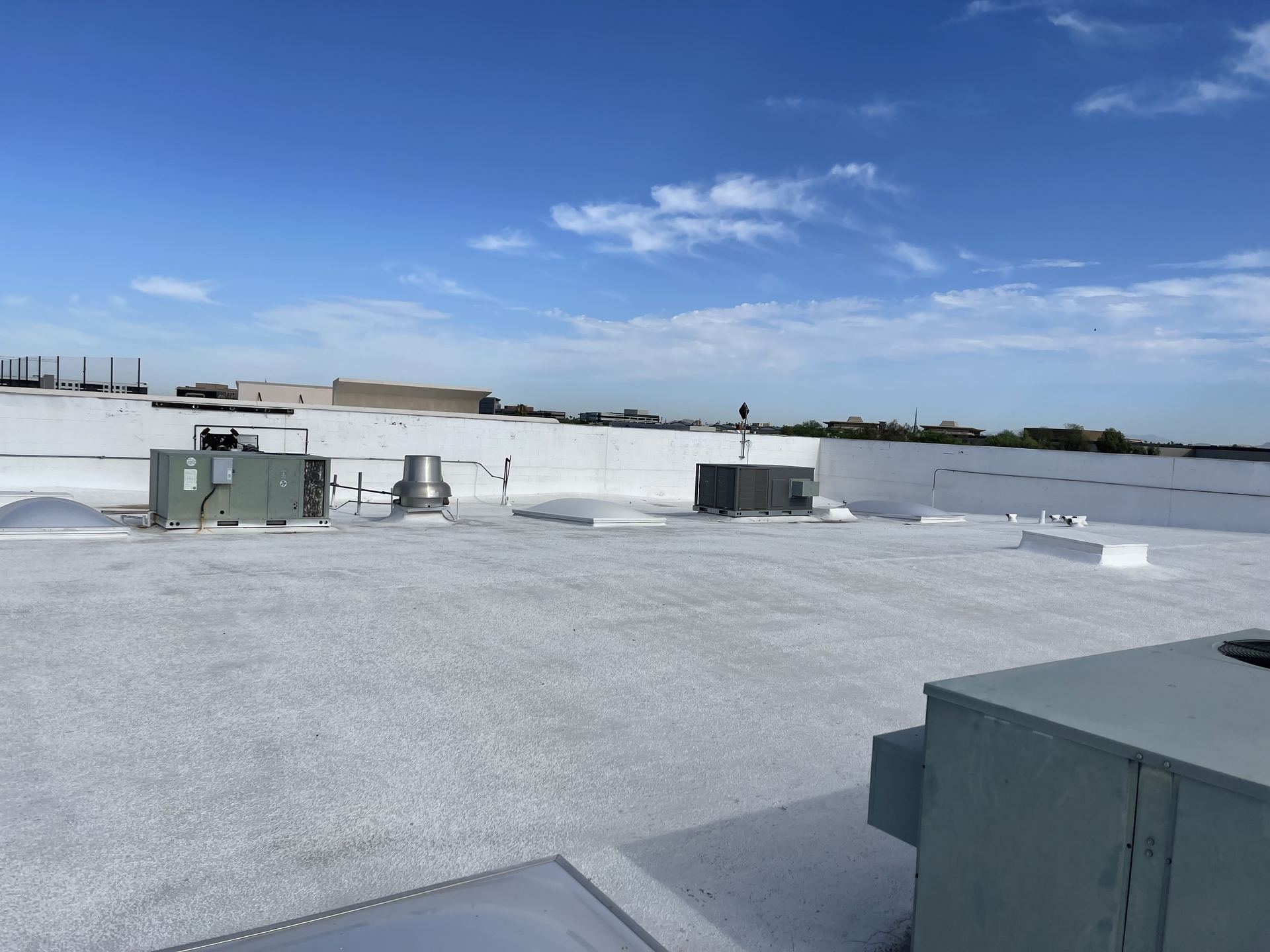 Freshly coated white commercial flat roof, Arizona
