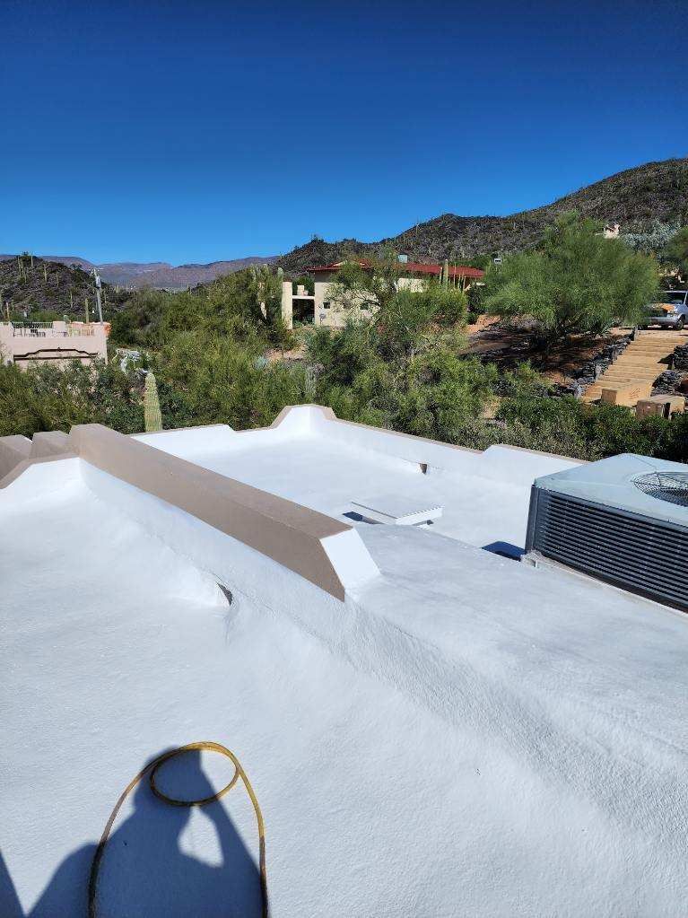 White spray foam flat roof overlooking the desert, Scottsdale